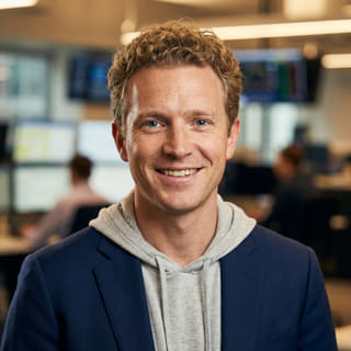 Ryan Brooks, listed as Lead Trading Analyst at VouchTenor, in a profile image